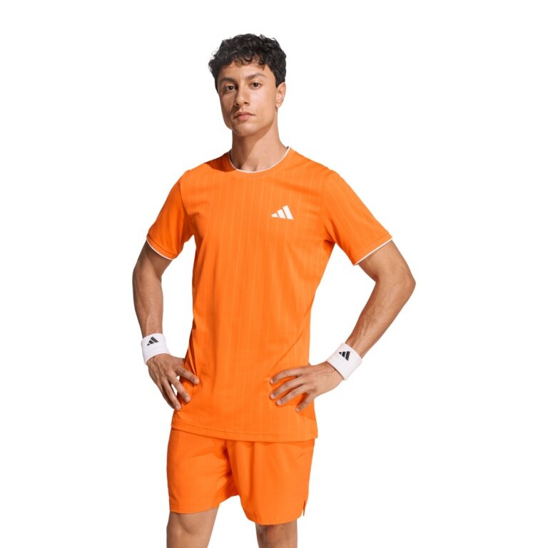 adidas Koszulka tenisowa Climacool+ Airchill Pro (wąska, optymalna swoboda ruchów) 2026 pomarańczowa męska